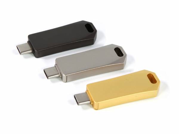Drei moderne USB-Sticks in Schwarz, Silber und Gold mit USB-C-Anschluss und Platz für individuelle Logo-Gestaltung.