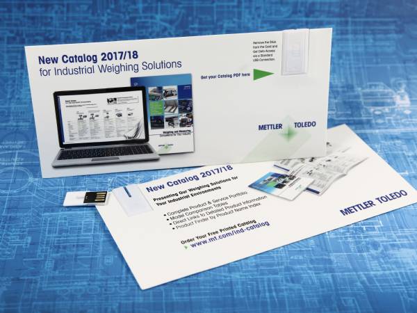USB-Mailingskarte mit integriertem Speicherstick und informativem Katalog zu industriellen Wiegslösungen.
