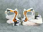 USB-Stick in Form eines Industrieroboters, ideal für kreative Promotion und individuell gestaltbar mit Firmenlogo.