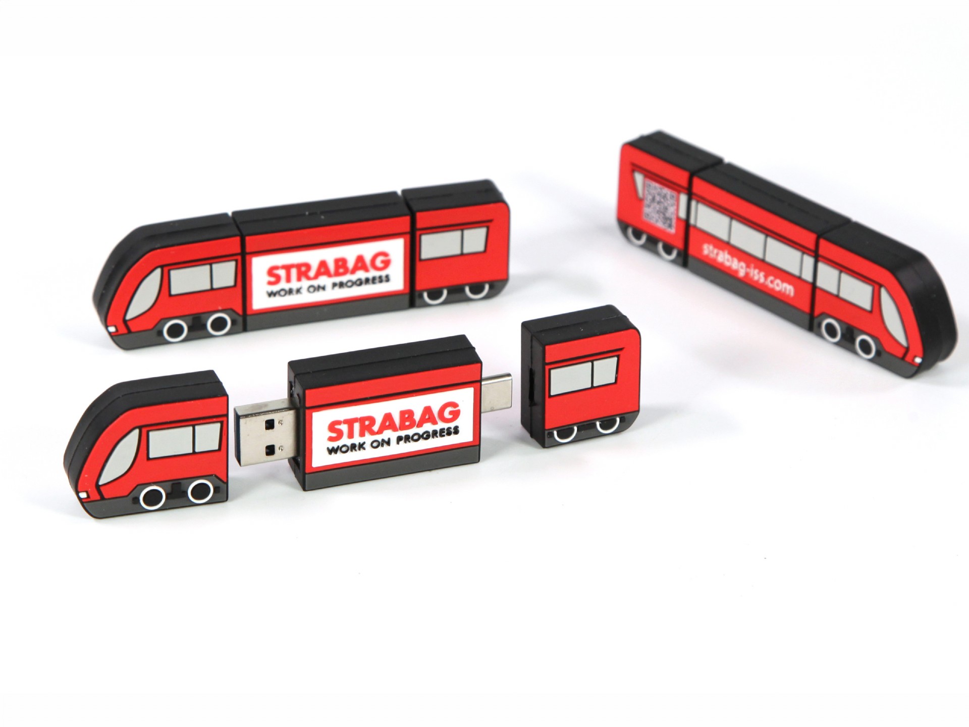 Hochwertiger USB-Stick in Form einer Straßenbahn, individuell bedruckbar mit Firmenlogo und markantem Design.